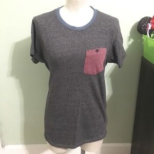 Gray tee shirt with red pocket